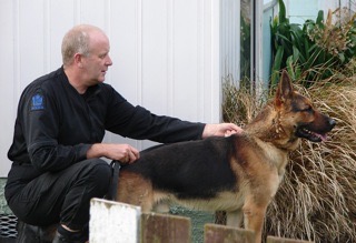 Senior Constable Bruce Lamb and police dog Gage