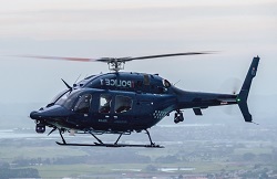 Eagle Air Support helicopters flying over Auckland City.