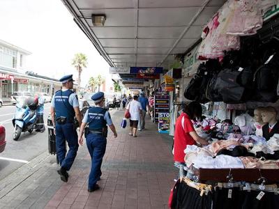 Police staff walking down the street