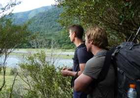 Backpackers in the bush in rural New Zealand. Photo copyright: Phil Petersen. 