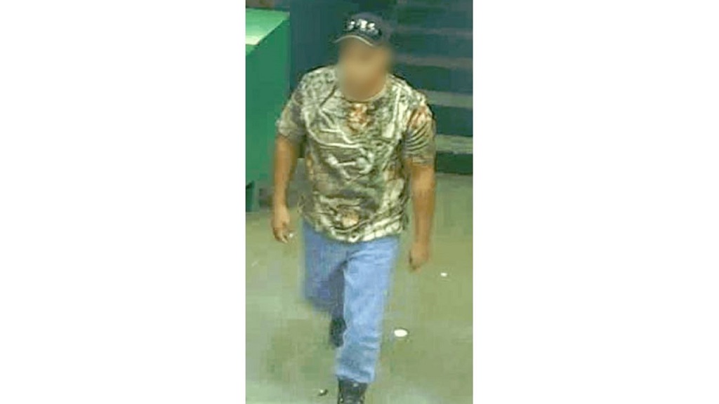 BP Tirau - person of interest entering the store prior to the homicide.