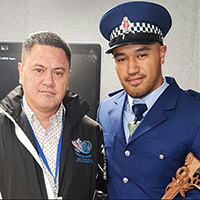 Asher and Te Pukenui on graduation day.