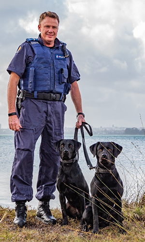 Sergeant Chris Harris with Floyd and Iti.