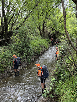 Search and Rescue team crossing a river 