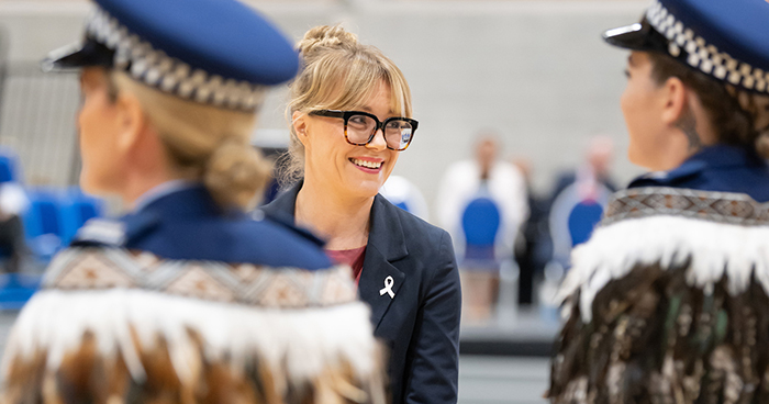 Patron Caroline Flora inspecting the wing.