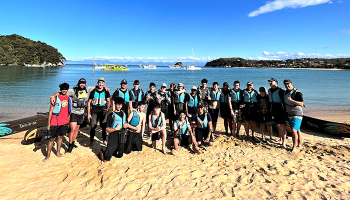 A group shot taken on the beach of of those on the trip in Abel Tasman National Park.