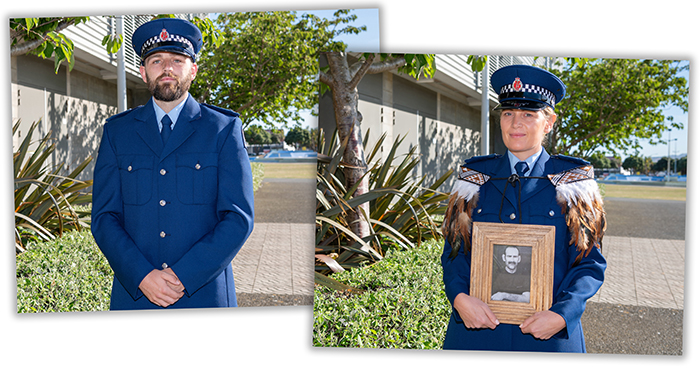 Constables Joshua Murphy and Natalie Tautari. Natalie is holding a photo of her late father Jimmy Molloy.