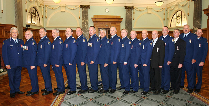 In 2007 Mark and his Ted Hotham wingmates celebrated 35 years' service. Pictured with then-Assistant Commissioner Peter Marshall.