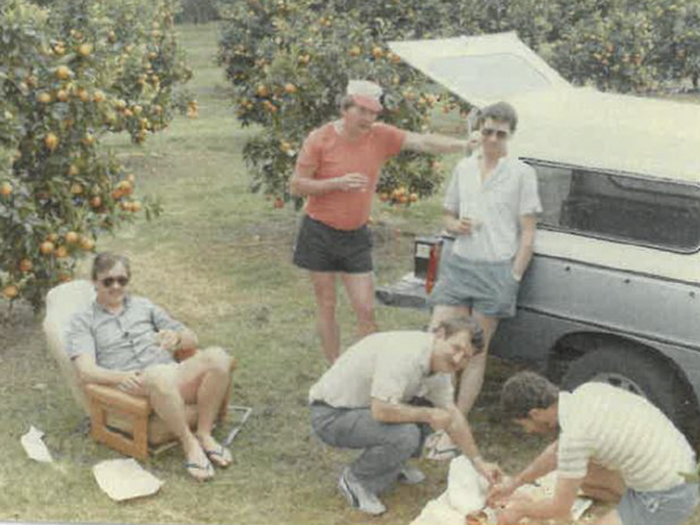 Taking five - in the early '80s on surveillance, working on heroin importation in Bay of Plenty on a local farm (Malcolm seated on the left).