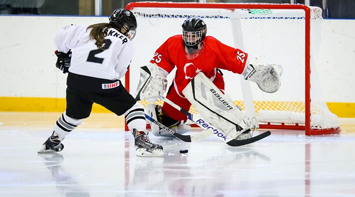 ...and scoring against Turkey in 2017. Anjali's shirt carries her maiden name Thakker.