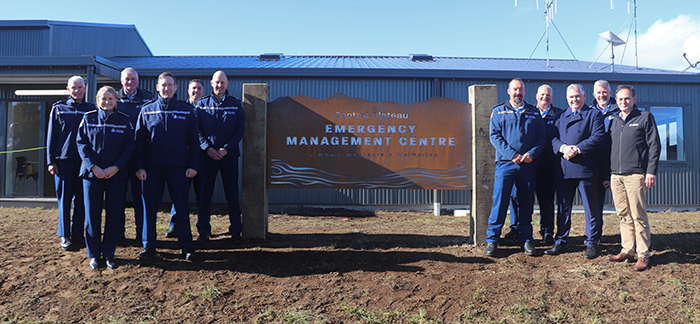 A Police team photo outside the facility with Minister Mitchell.