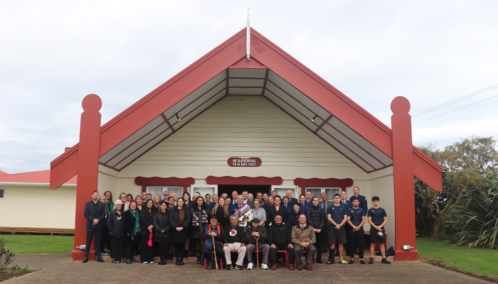 The group outside the wharenui.