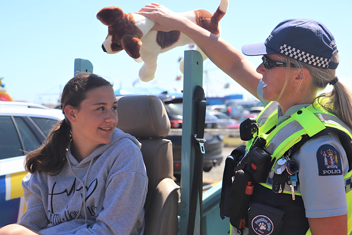 Senior Constable Mel Allen explaining the risks of having unsecured pets in a car.
