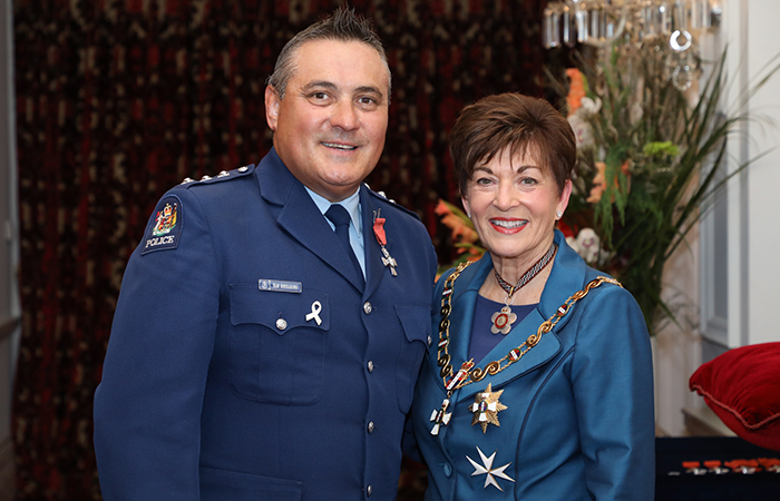 Sam receiving his Member of the New Zealand Order of Merit (MNZM) from Governor-General Dame Patsy Reddy.