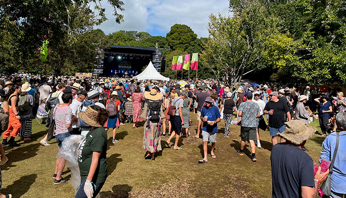 Photo of the WOMAD stage and some of the thousands of people in attendance.