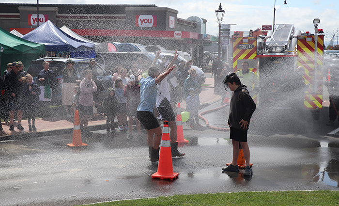 Rikki runs the gumboot relay gauntlet.