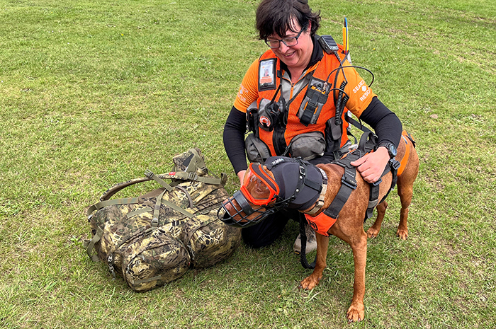 LandSAR volunteer Juliet Burgh with her SAR dog Tony.