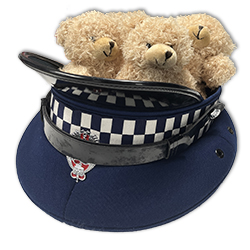 Angel bears in an upturned police hat 