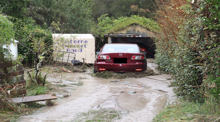 Residents of Valley Road forced to evacuate their home after flood water engulfed their address.
