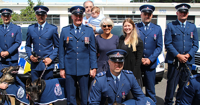 The final parade - Wellington Dog Section handed Mark back to wife Pene and their whānau at a formal parade at the Ngauranga Dog Base on his last day. Photo: Jed Bradley