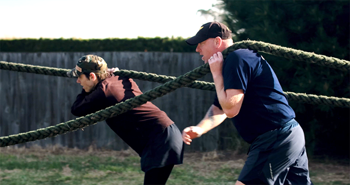 Glenn Dawson with a participant during an LSV course.