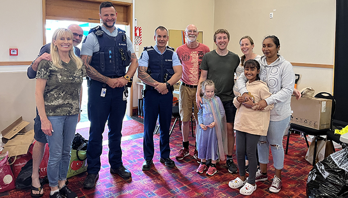 Sergeants Sean Burn (left) and Jon-Paul Tremain at Bay Baptist Church with volunteers.