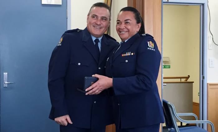 Mel receiving her 14-year long service and good conduct award from Inspector Sam Aberahama at Wairoa Police Station in 2018.