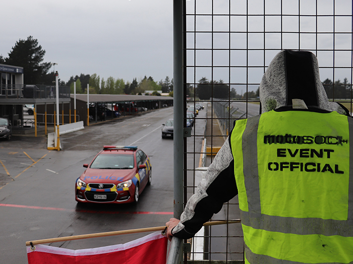 Police offer Motosoc the use of a Police Commodore SV6 as a safety car to lead the pack around for their two-lap orientation drive, where participants take their car out at a slow pace to orientate themselves with the track at the start of the day.