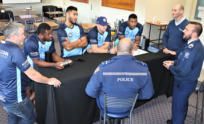 The police team of Doug Te Puni, Terry Phillips and John Pickering with some of the Taniwha rugby players.