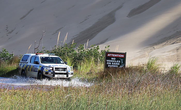 Driving the patrol truck through water and the sand dunes