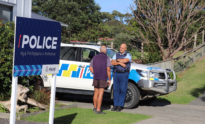 Senior Constable Leon Shepherd talking to a member of the public outside the Police station.