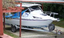 1998 Ramco Fishmaster runabout.  Blue ca