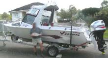 2005 silver/burgundy aluminium Vision boat - 2006 Mariner Optimax 115hp outboard