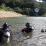 Police National Dive Squad members preparing for a search of the Ross Creek Reservoir in April 2014