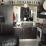 Another view of the kitchen and living area in the unit.