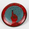 Photo of a “GOTCHA” Badge