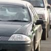 Close up image of cars on a road.