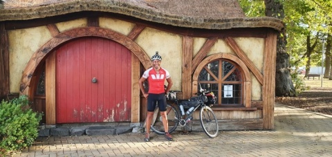 Constable Brook Armishaw with his bike in Hobbiton.