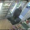 CCTV image of offender in Knighton dairy