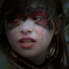 Girl's face painted for Halloween.