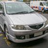 Silver Mazda Premacy station wagon, registration EWR953