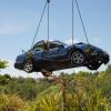 HIGH BUT NOT DRY; the car as it is lifted from the Waikato River