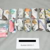 Bags of ContacNT wrapped in newspaper seized during 40 search warrants acroos Auckland and Waikato.