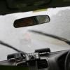 The view of how heavy the rains were from the interior of a patroling Police vehicle