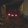 The offending car sits on top of the written off parked vehicle