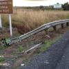 One of the roadside barriers damaged as the truck slowly passed