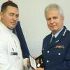 Commissioner Peter Marshall presents the Meritorious Service Medal to Joe Catterall, who received the award on behalf of his uncle, the late Sergeant Paddy Whiu
