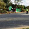 Police crash investigators inspect the scene of this afternoon's fatal crash
