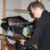 Waikato Arms Officer Richard Plas examines a recovered firearm