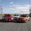 The new cars alongside a regular white patrol vehicle